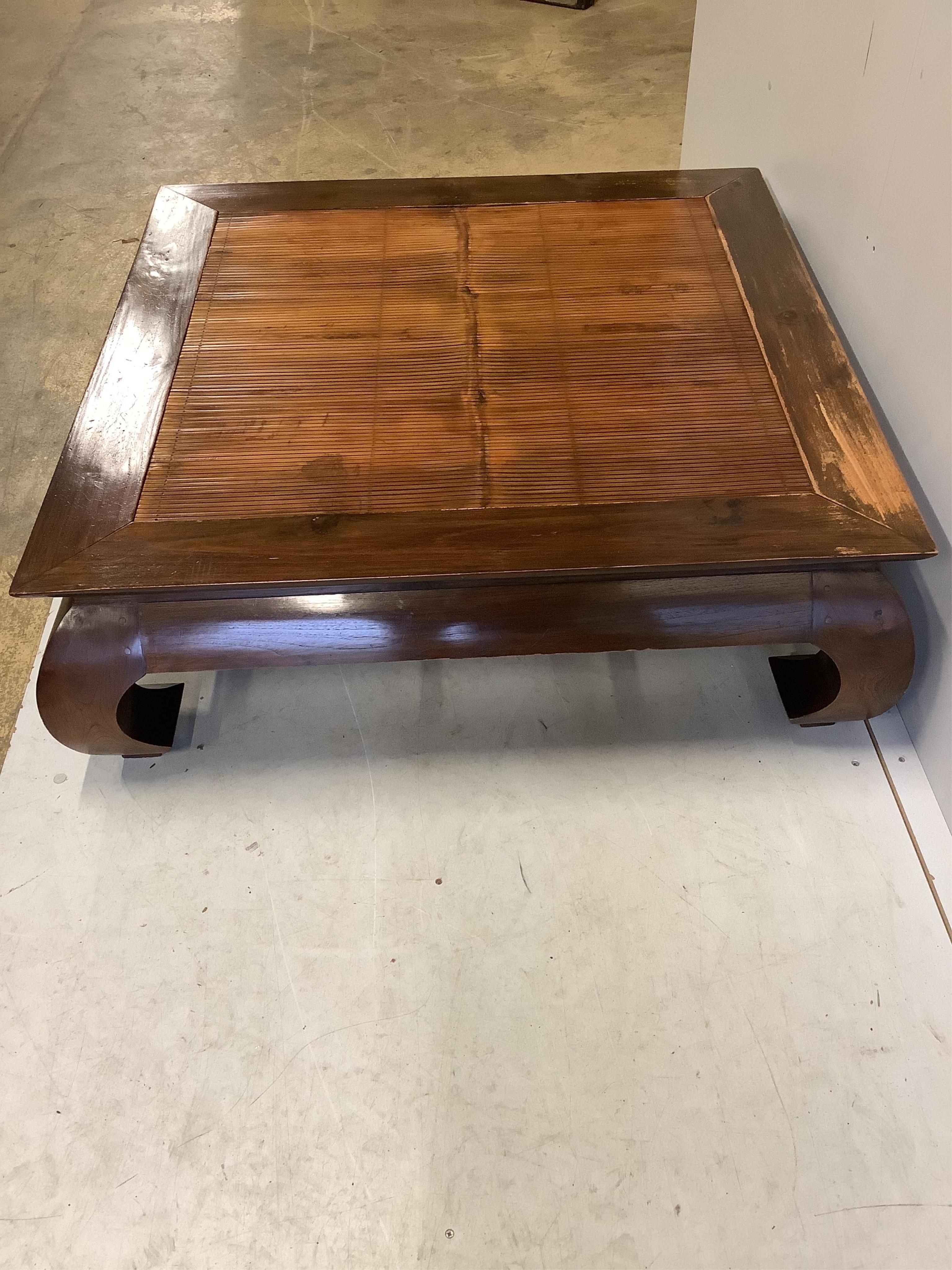 A Chinese hardwood and bamboo square coffee table, 105cm, height 34cm. Condition - fair